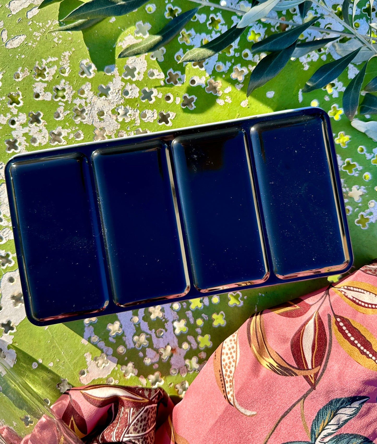 Empty metal tin for 48 half pans